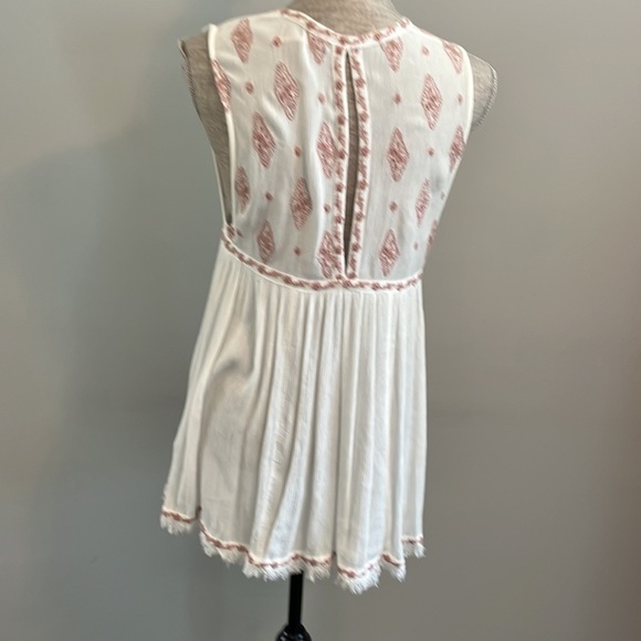 Free People size xs sleeveless flowy blouse.  Embroidery o top and hem.  Keyhole - Picture 2 of 5